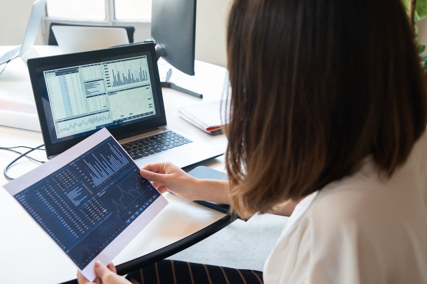 Team reviewing enterprise ERP dashboards and business data